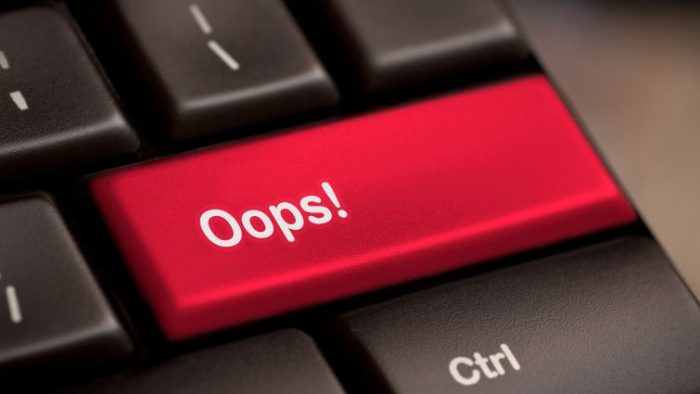 Common Mistakes to Avoid in Your Cover Letter - a button on a keyboard that says "oops!"