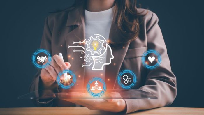 How to Apply Your Management Skills in a New Industry - a manager with different icons representing management skills.