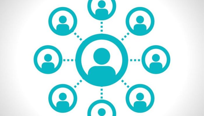 How to Build a Professional Network - a network of silhouettes connect across the world.